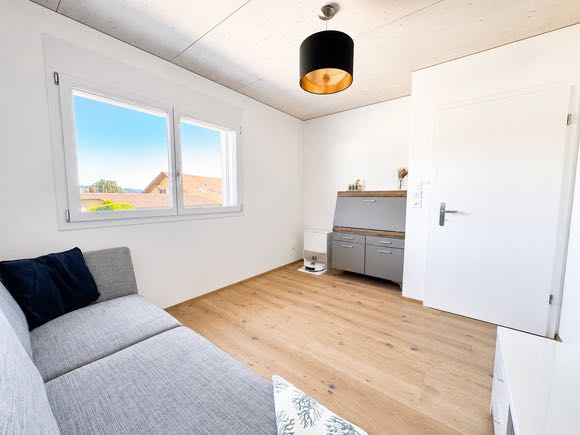 Zimmer mit Sitzgelegenheit